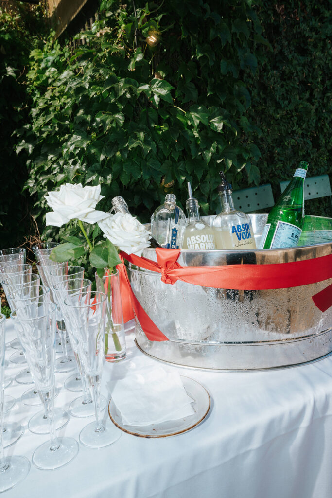 Luxurious array of champagne glasses and bottles at the ready 