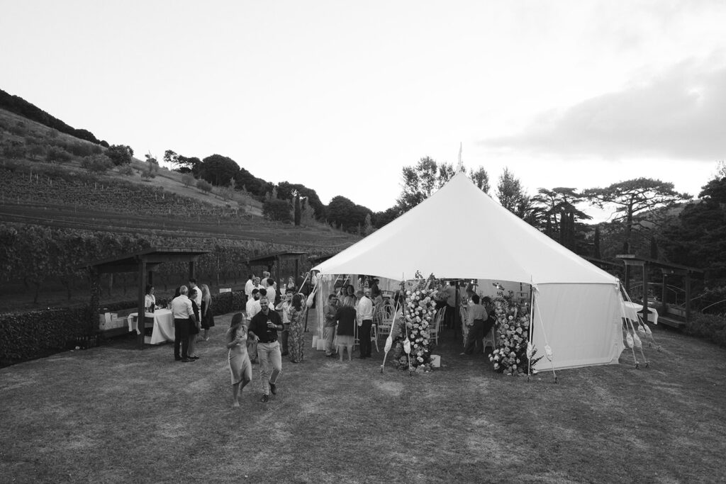 Guests enjoy the Tipi Tent Wedding at Poderi Crisci